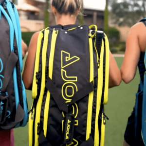 Backview of a pickleball player wearing the JOOLA Tour Elite Pro Pickleball Duffle in Black & Yellow