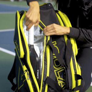 Player putting their pickleball paddle away in the JOOLA Tour Elite Pickleball Duffle Bag