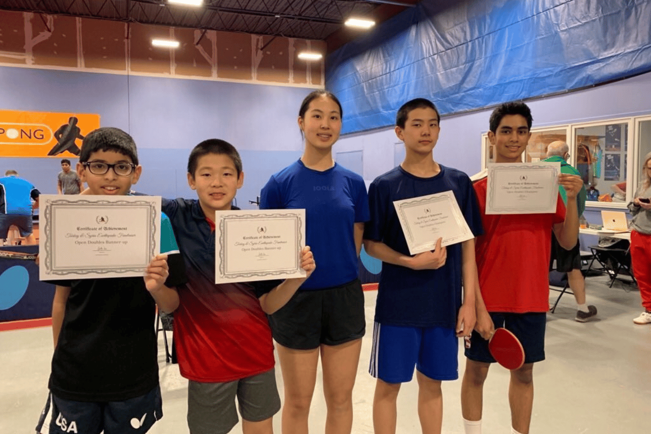 Faith Hu with the champions of the Syria and Turkey Earthquake Relief Table Tennis Fundraiser Tournament